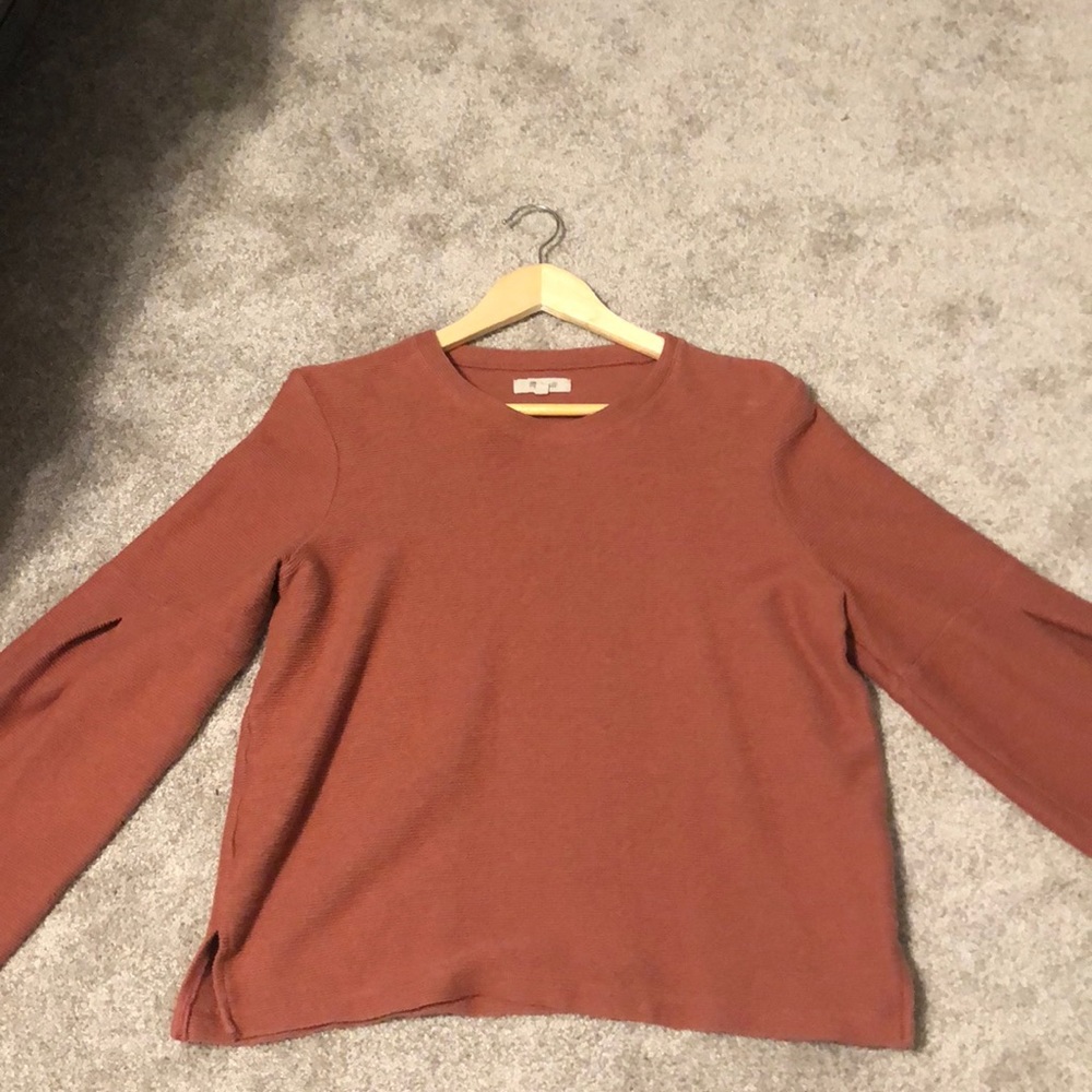 Bell sleeved top
